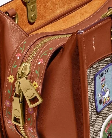 Túi xách nữ phom chữ nhật Disney X Coach Rogue 25